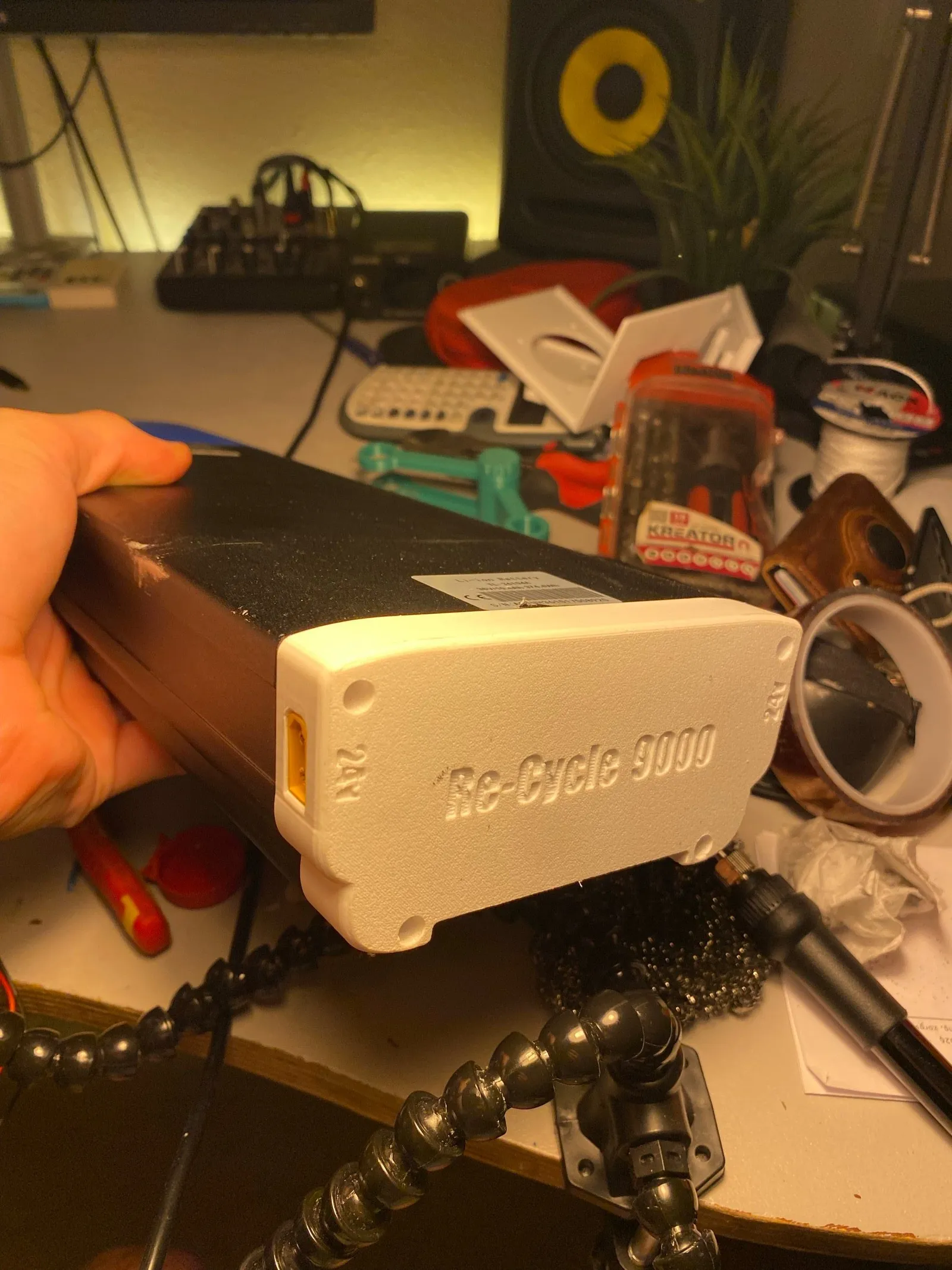 The assembled new back plate showing the 3D-printed part with the name of battery "Re-Cycle 9000" with the 24V XT-60 port used for powering my compressor coolbox and other devices.