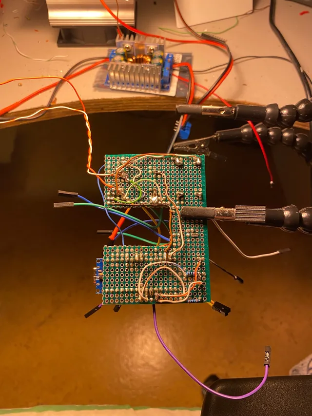 A close-up of the soldered control boards and their point-to-point wiring.